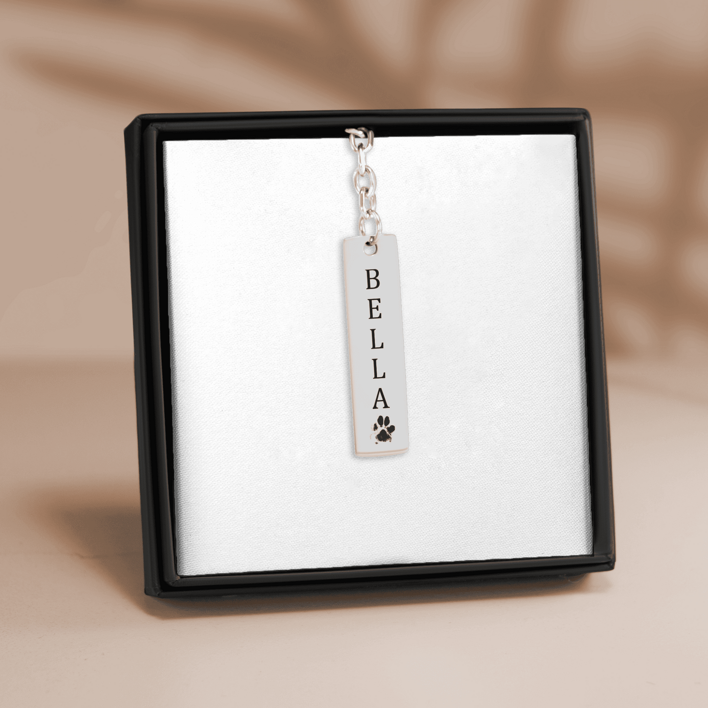 Porte-clés Barre Gravée. Son nom, sa patte, votre lien